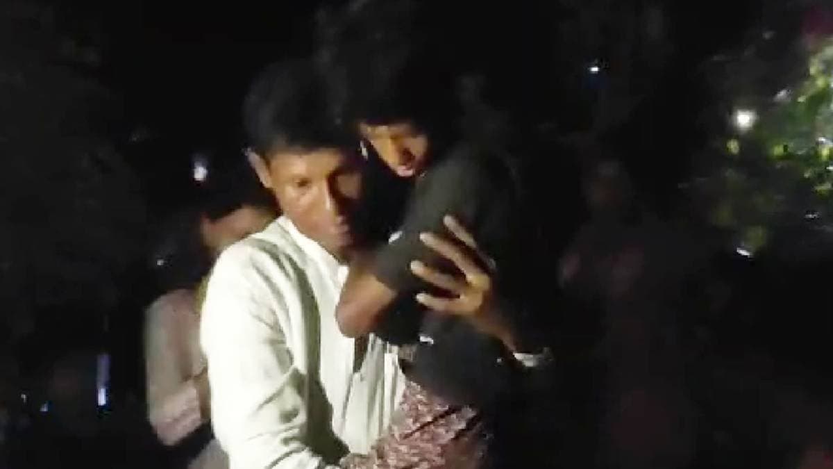 Mentally challenged boy climbs up mobile tower