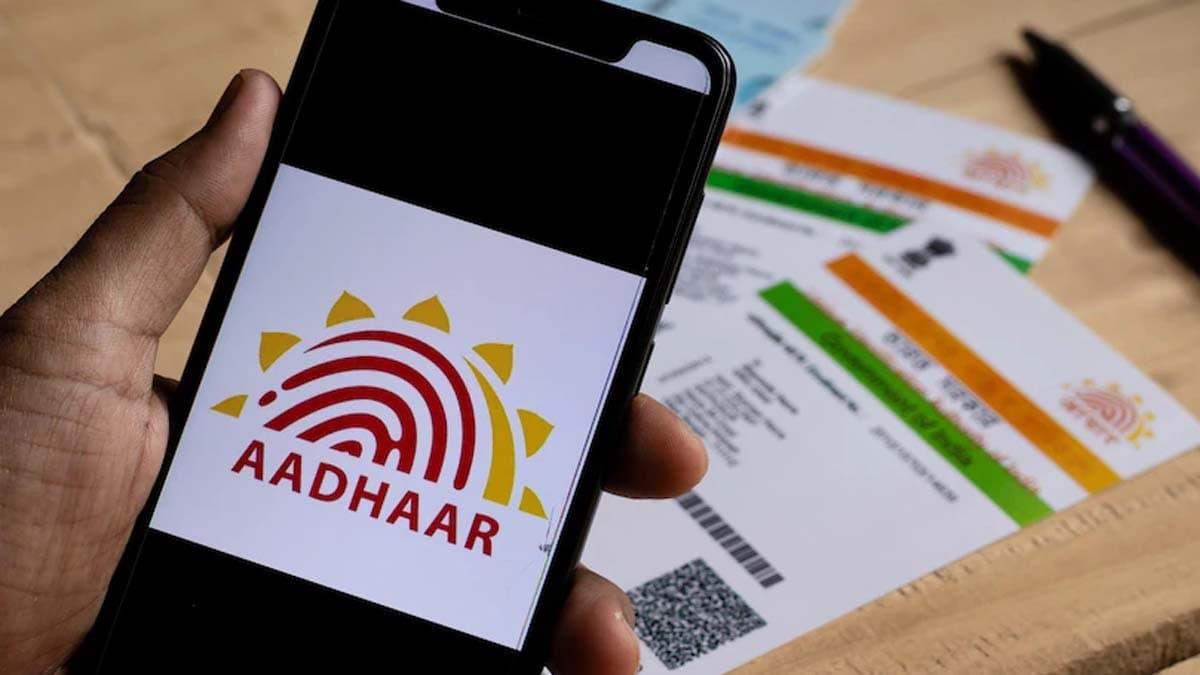 How many times can you change your mobile number name date of birth and address in your Aadhaar card