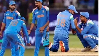 Virat Kohli playfully touches Axar Patels feet - video goes viral