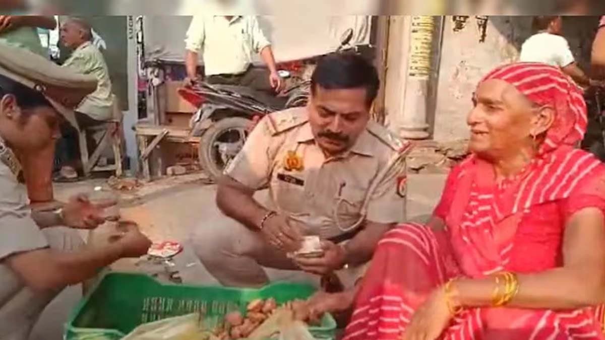 Utter Pradesh Police Officer lights up elderly womans diwali buys all diyas from her watch viral video