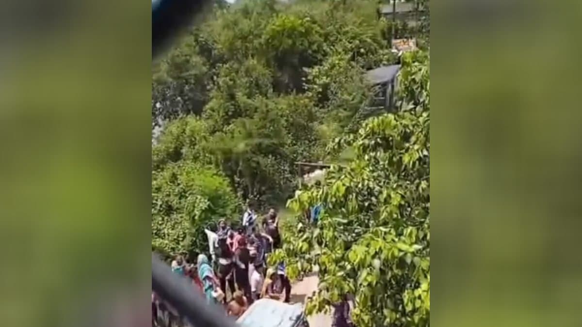 To avoid knock down by train elderly person jumped into river with his granddaughter