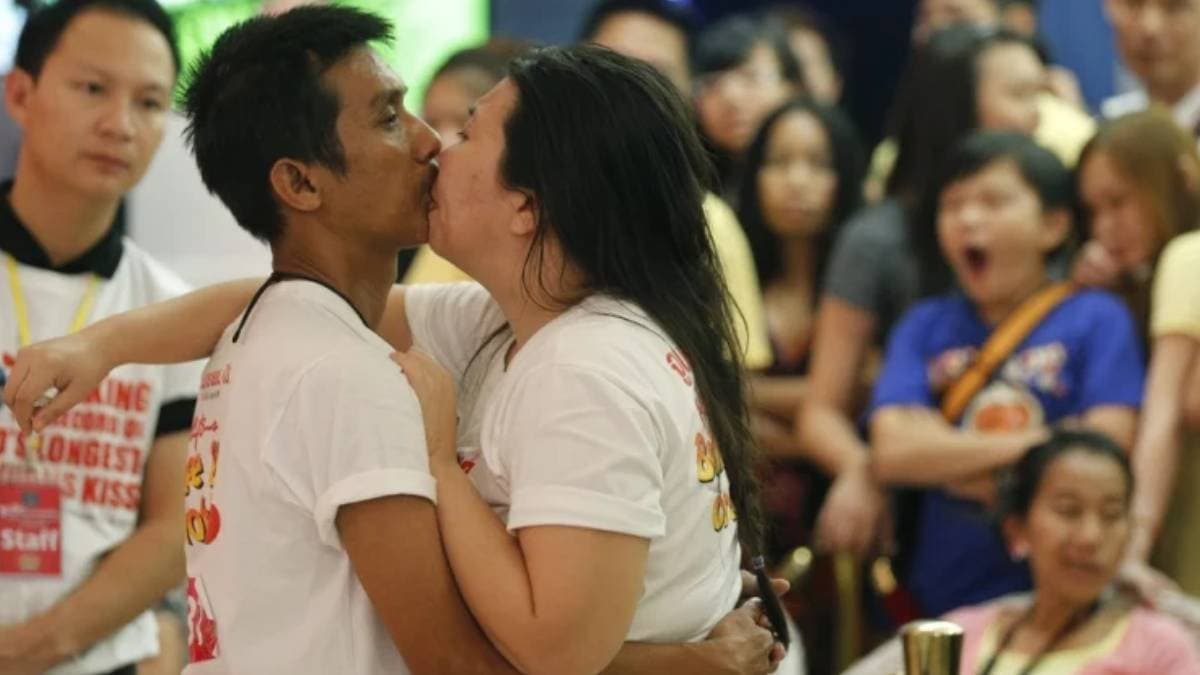 A couple kisses for a record-breaking 58 hours