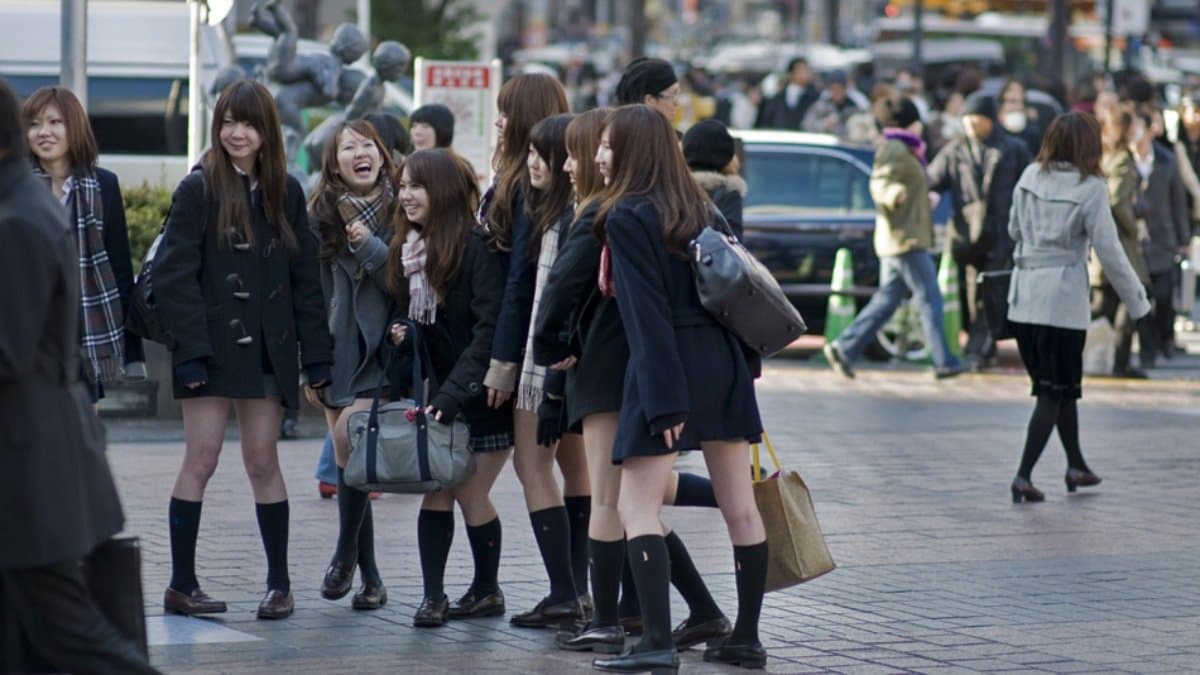 Why Japanese school girls always wear short skirt despite of the weather