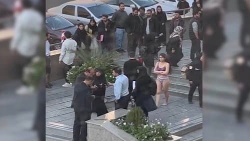 Woman Strips At Iran University To Protest Strict Dress Code gnr 