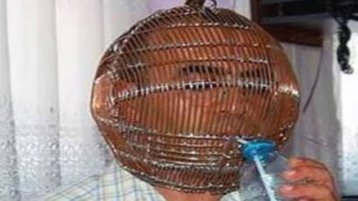 turkish man ibrahim yucel locks his head in cage shaped helmet to quit smoking