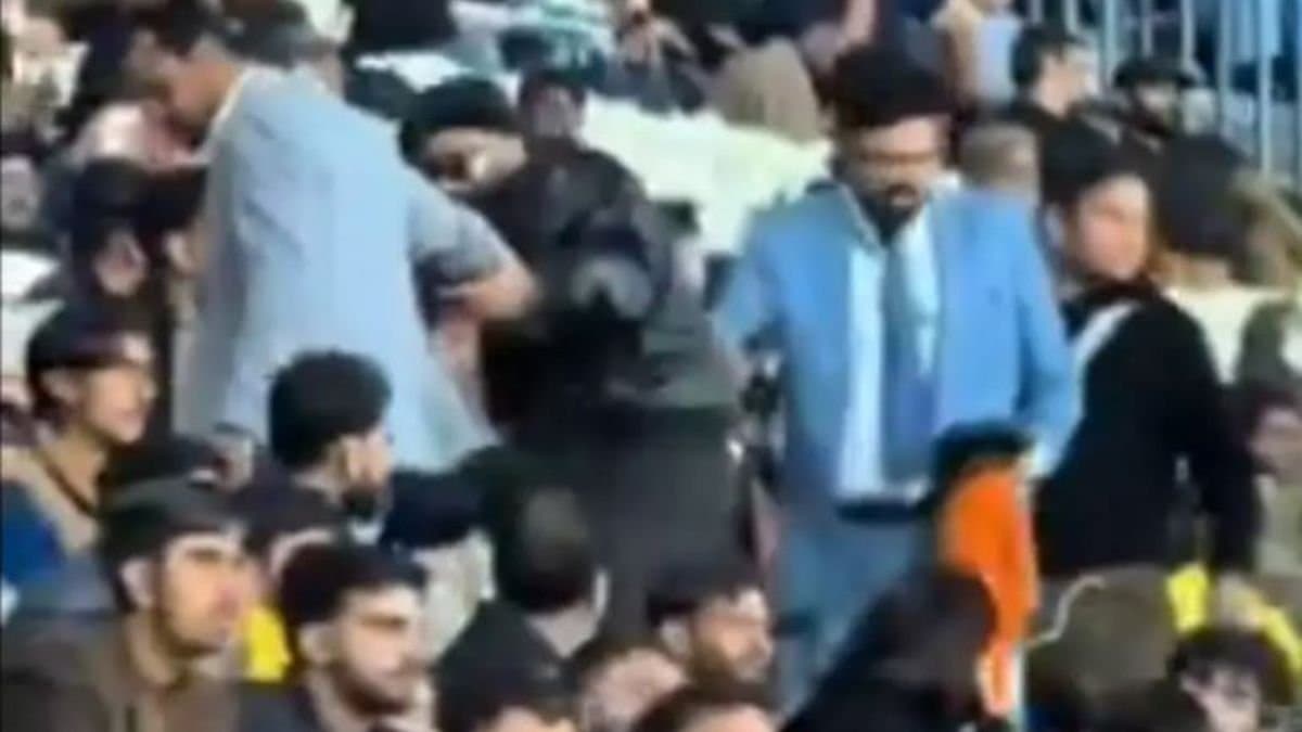 Pakistani fan manhandled for waving Indian flag at lahore stadium during England vs Australia Champions Trophy match spt 