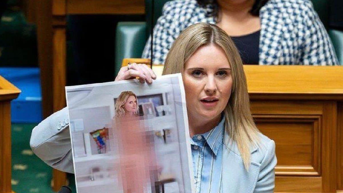 To highlight the dangers of deepfake technology MP Laura McClure Holds Up AI-Generated Picture of Herself in Parliament