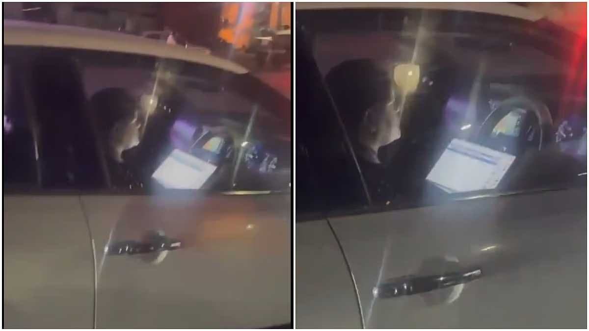 Bengaluru Woman fined for using laptop while driving