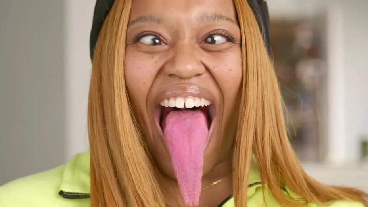 Woman with the longest tongue of world can touch her nose with it