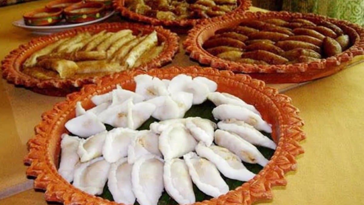 makar sankranti 2025 why eating pitha ritual is celebrated on makar sankranti know this unknown fact about this day lif