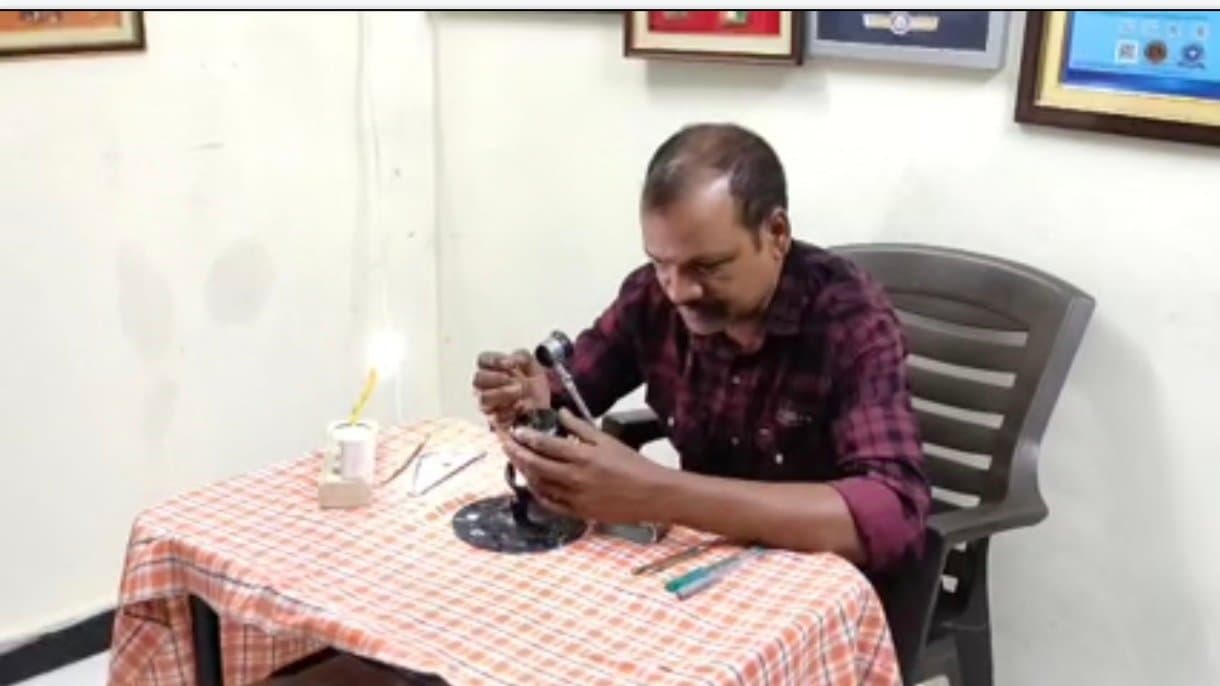 Telangana man carves miniature idol of Lord Ganesh on betel leaf 