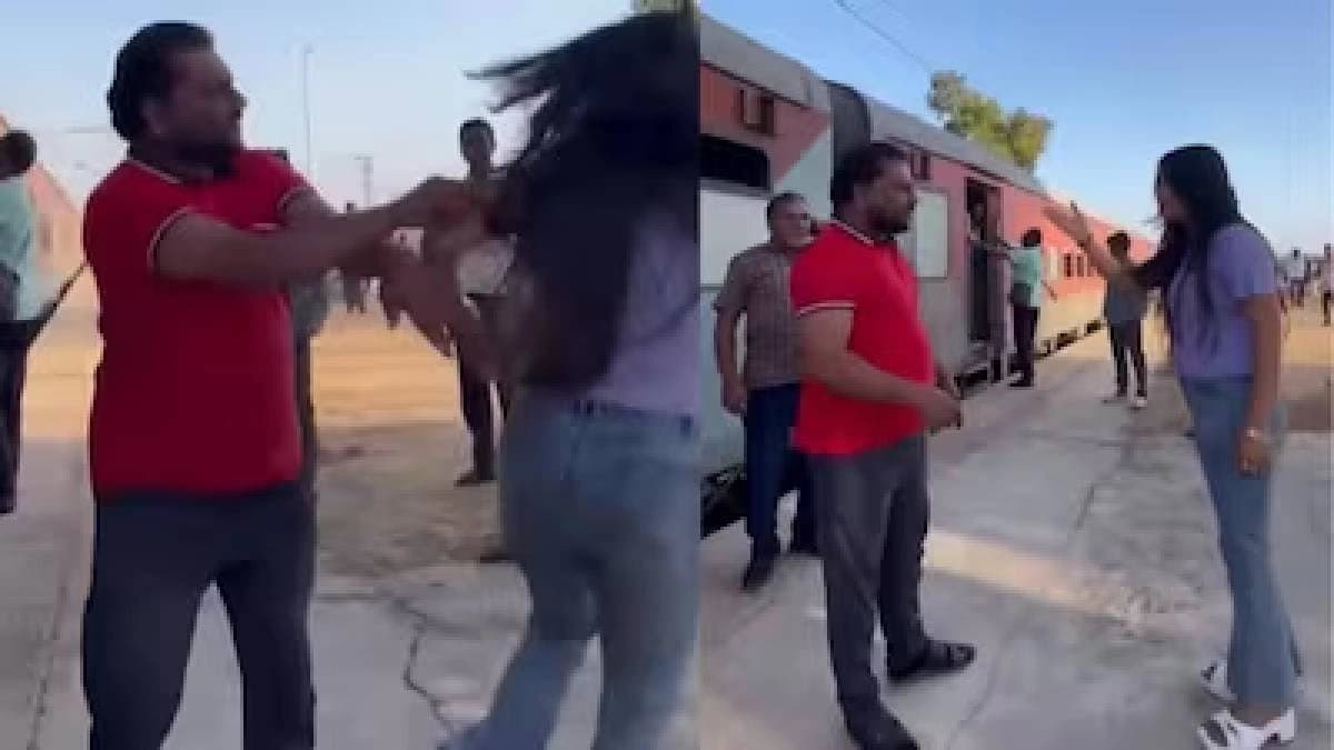 Man Pushes Woman Filming Reel At Railway Station