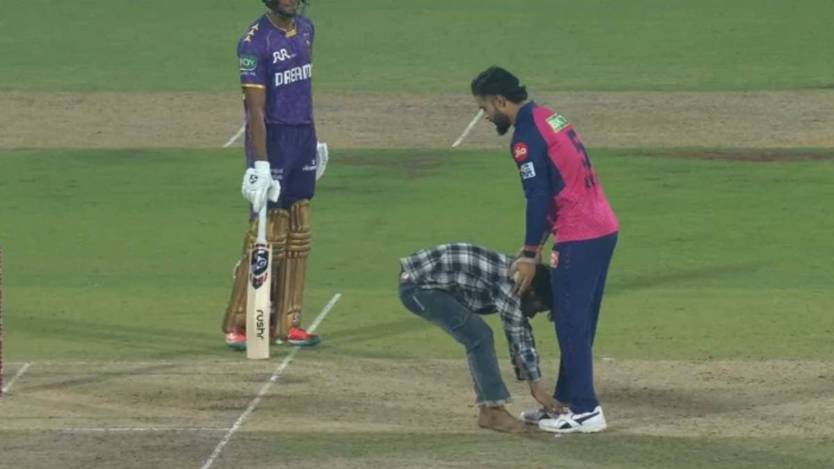 IPL 2025:A fan invaded the field in Guwahati to touch the feet of  Riyan Parag during Kolkata Knight Riders vs Rajasthan Royals match spt 