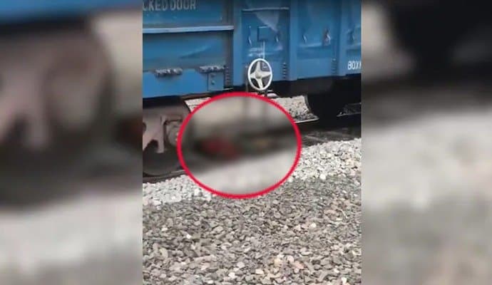 Woman's Miraculous Escape After Train Passes Over Her In Telangana gnr 