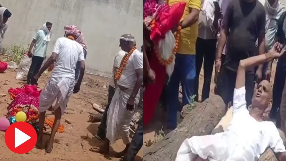 Younger son lies on pyre demanding silver bangles of his dead mother halts cremation