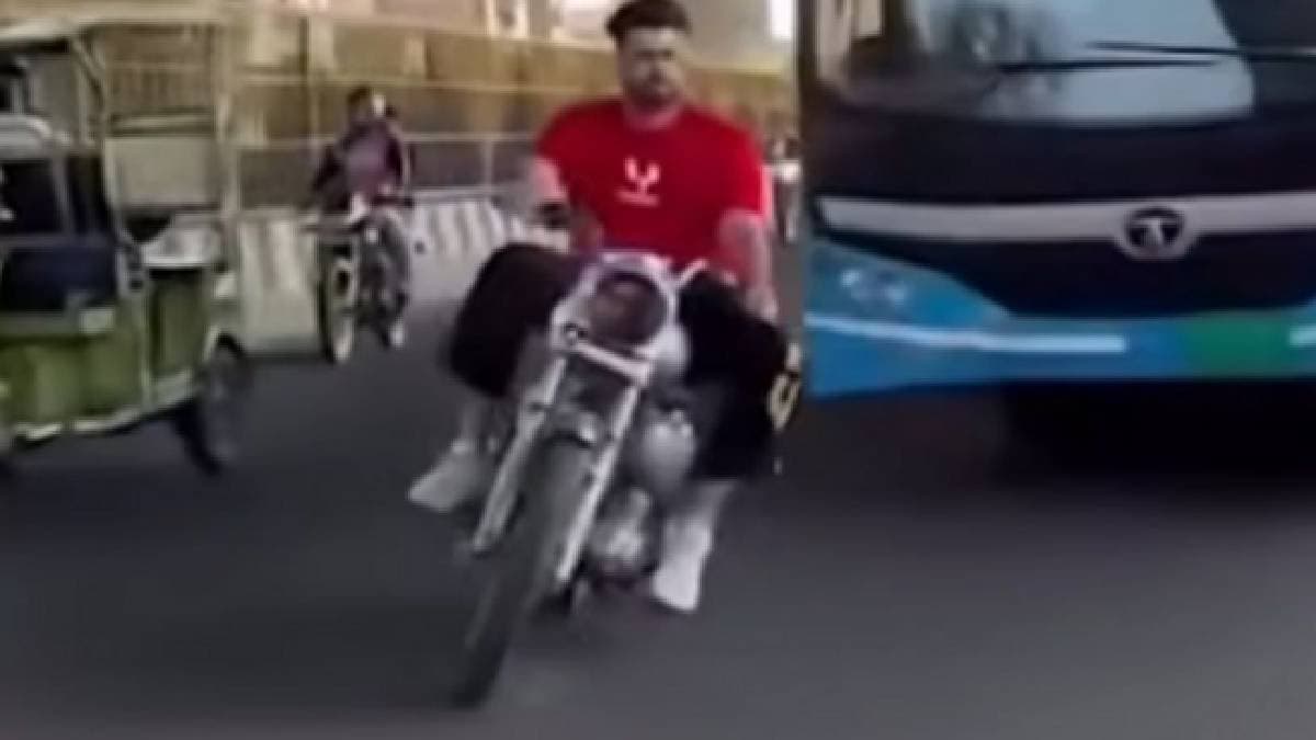 Young Biker Gets Trapped While Trying To Show Off His Skills