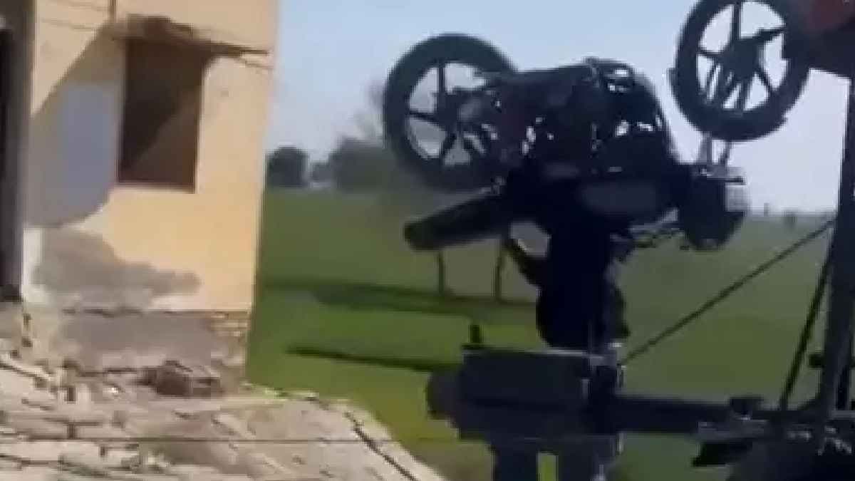 Man crosses rail gate with bike on his shoulders viral video causes huge uproar