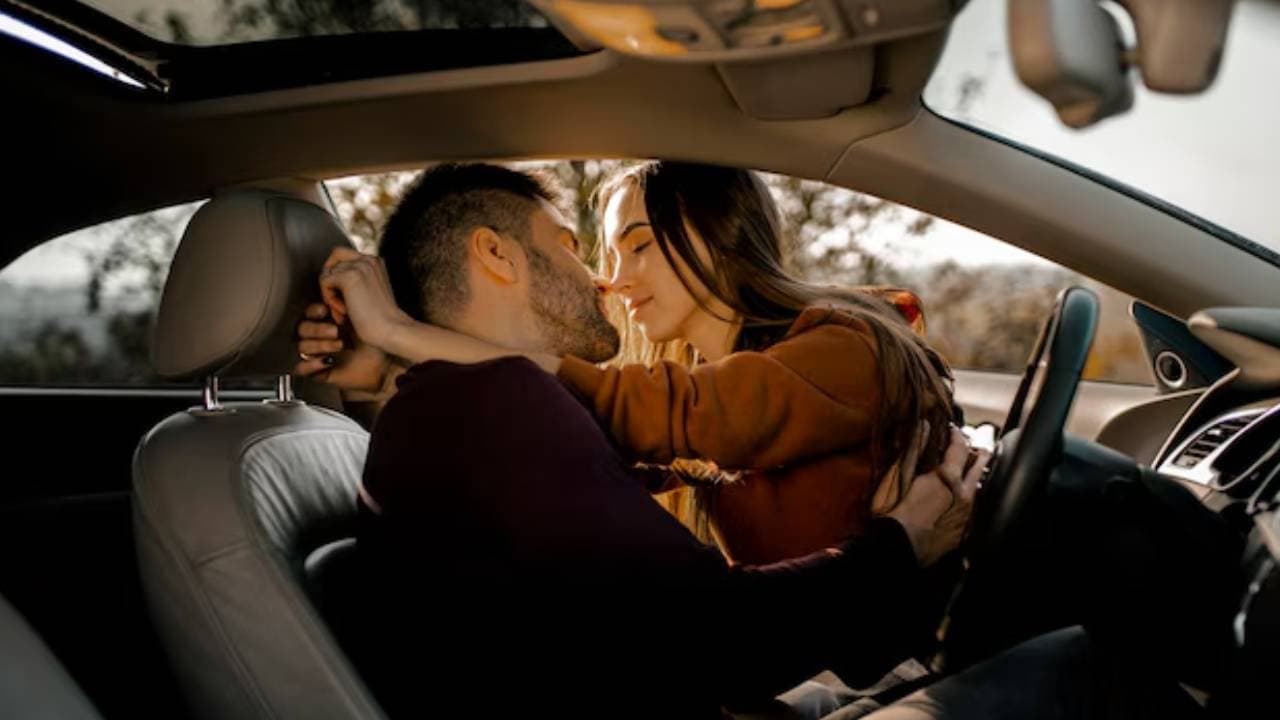 Couple intimacy in a fast running car in germany