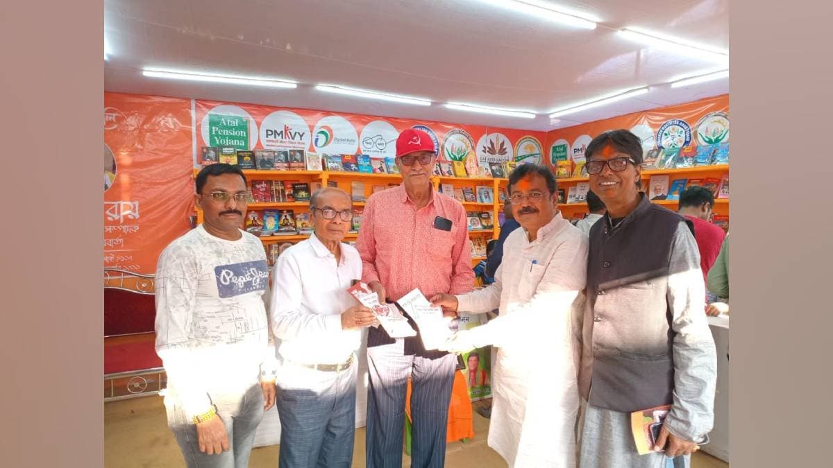 suspended cpim leader tanmoy bhattacharya at bjp book stall in book fair 2025